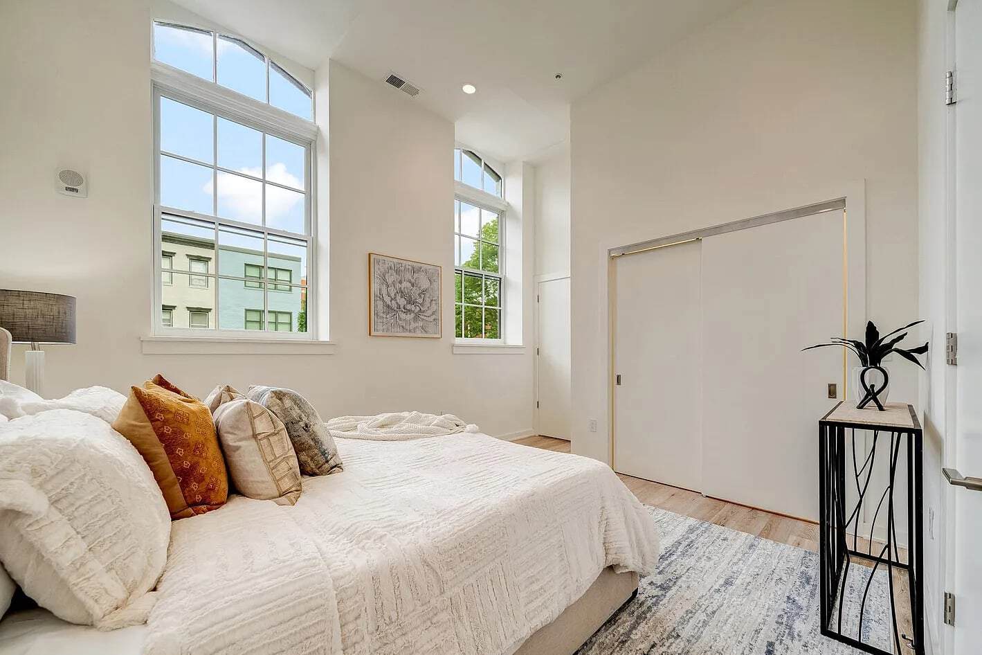 Interior house painting: bedroom with fresh white walls
