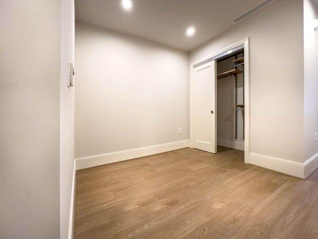 Painted bedroom with closet and trim