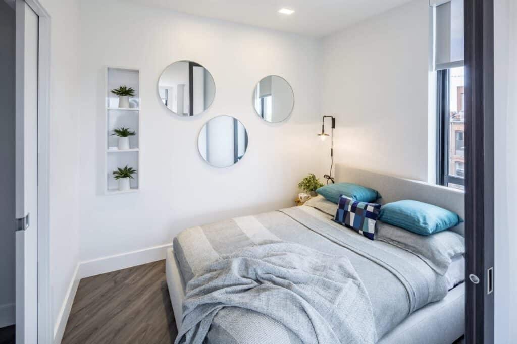Guest bedroom with freshly painted white walls